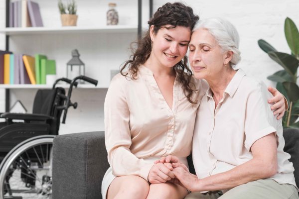 young-daughter-sitting-sofa-embracing-her-mother_11zon-2048x1367